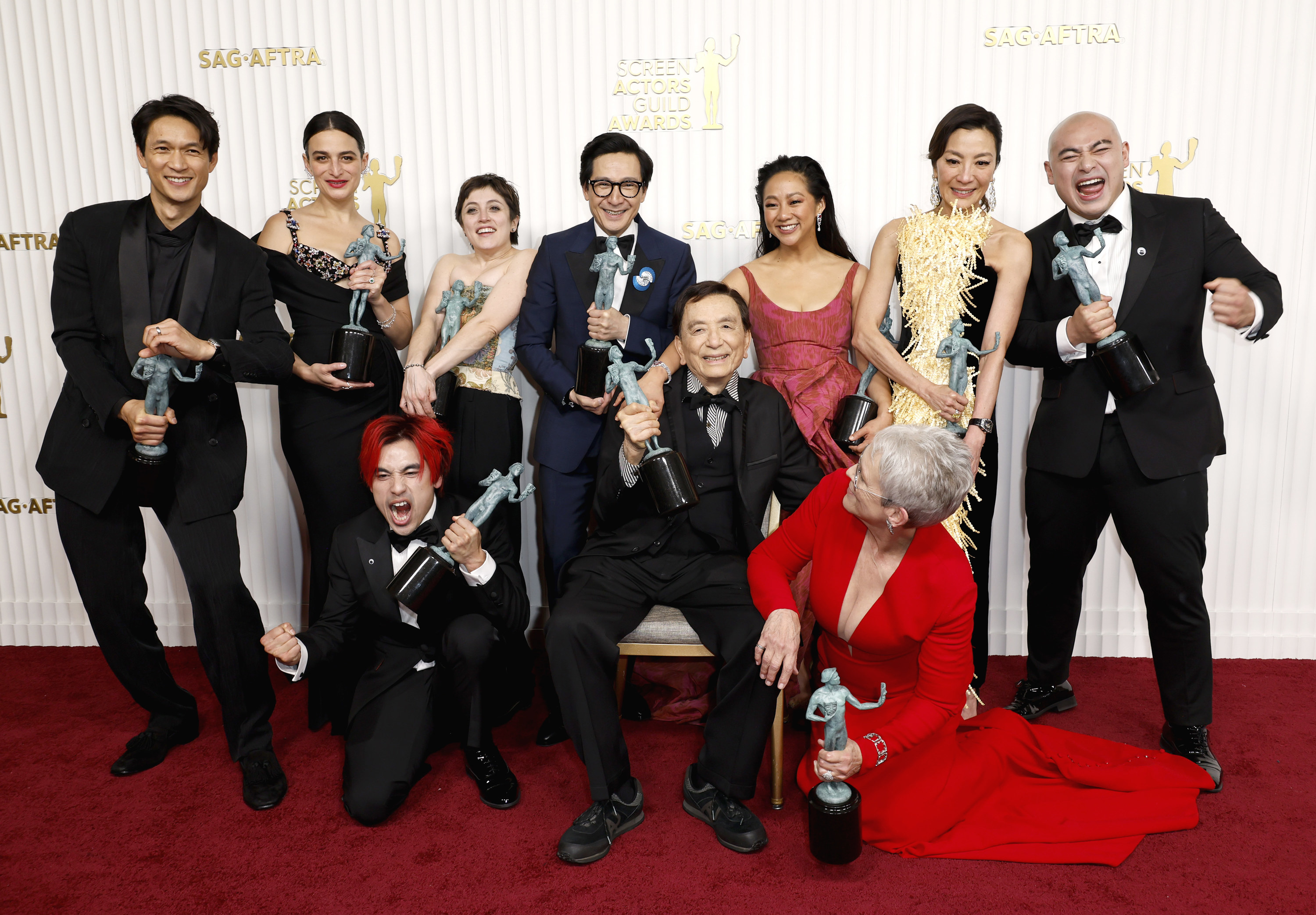 Harry Shum Jr., Jenny Slate, Andy Le, Tallie Medel, Ke Huy Quan, James Hong, Stephanie Hsu, Jamie Lee Curtis, Michelle Yeoh and Brian Le, recipients of the Outstanding Performance by a Cast in a Motion Picture award for &quot;Everything Everywhere All at Once&quot;