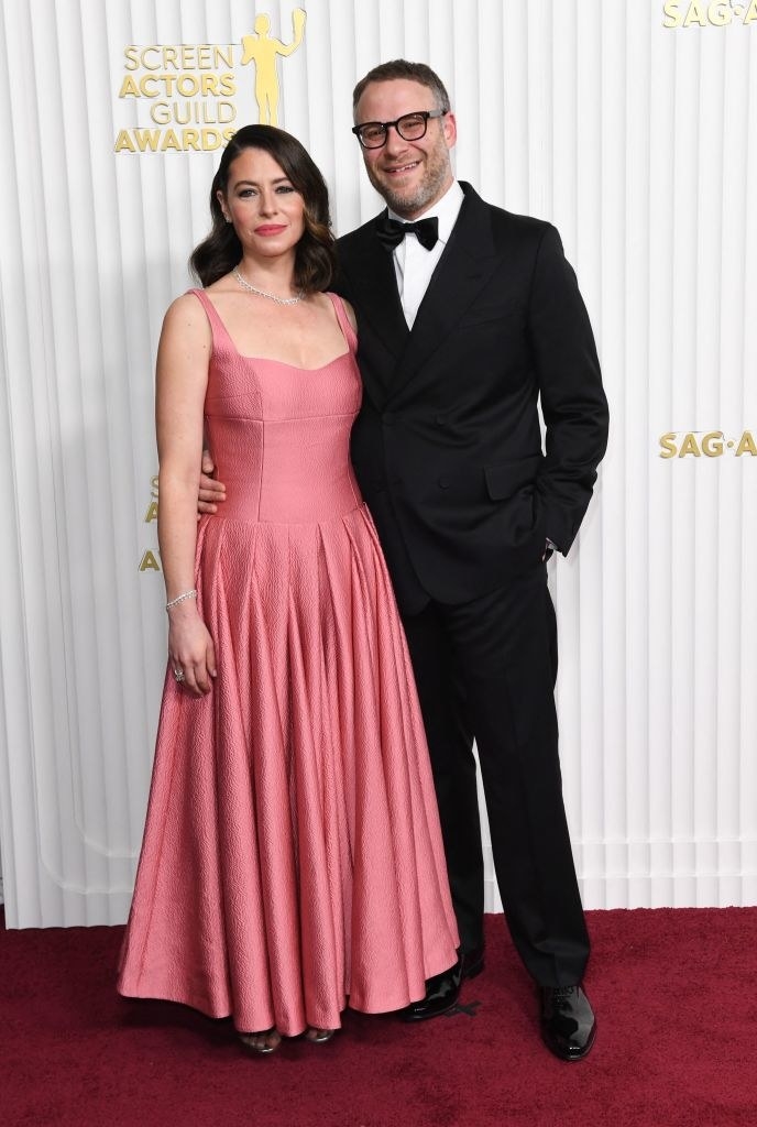 Seth Rogen with his around his wife, Lauren Miller, on the red carpet for the 29th Screen Actors Guild Awards