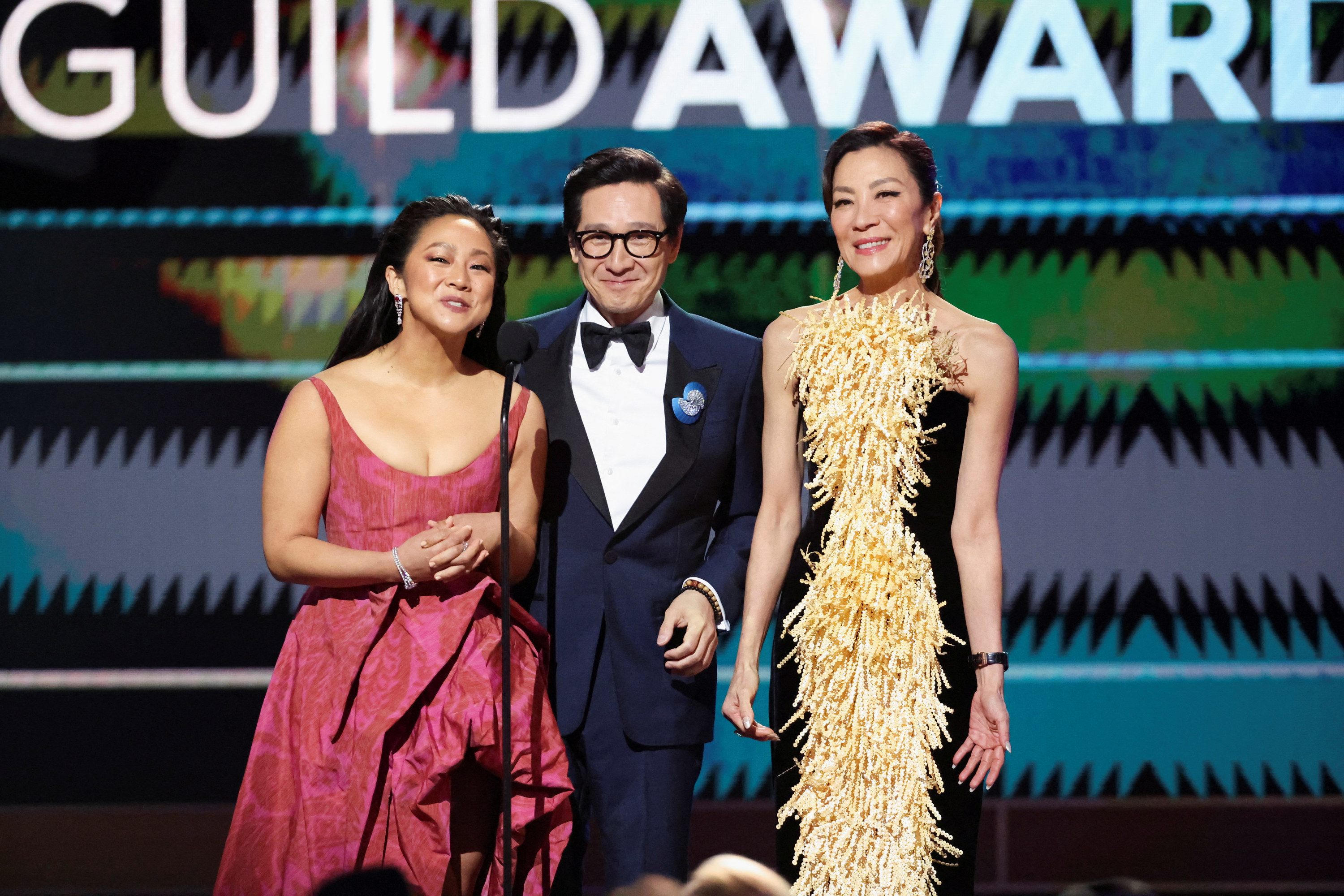 Stephanie Hsu, Ke Huy Quan, and Michelle Yeoh onstage during the 29th Screen Actors Guild Awards at the Fairmont Century Plaza Hotel in Los Angeles