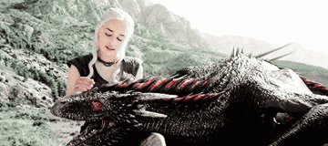 Daenerys Targaryen petting Drogon in &quot;Game of Thrones&quot;