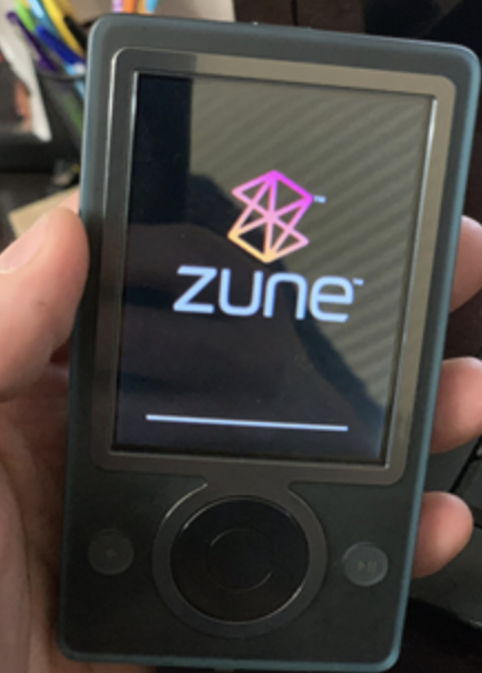 hand holding a zune