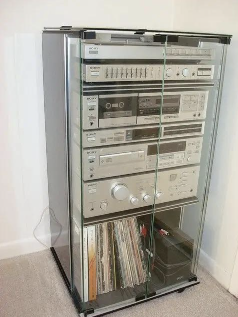 large tower radio in a clear entertainment case