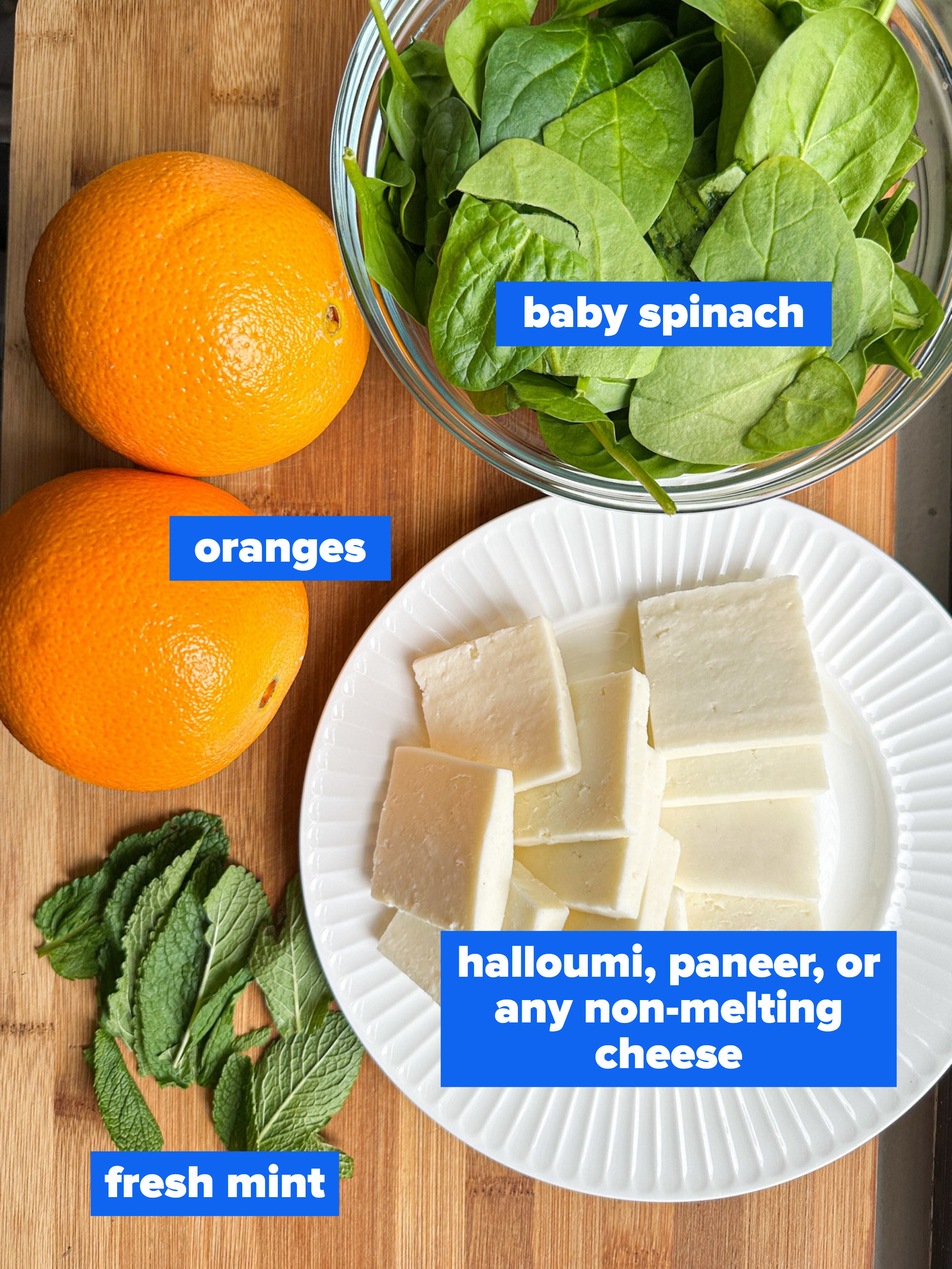 baby spinach, oranges, halloumi, paneer, or any non-melting cheese, and fresh mint