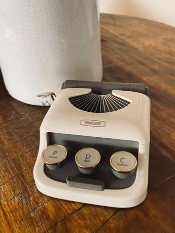 a reviewer's typewriter label maker
