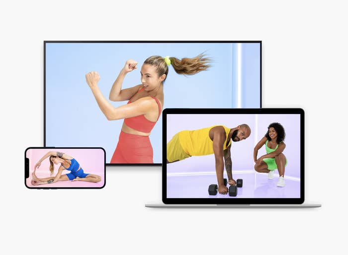 a phone, tv, and laptop showing different work out classes