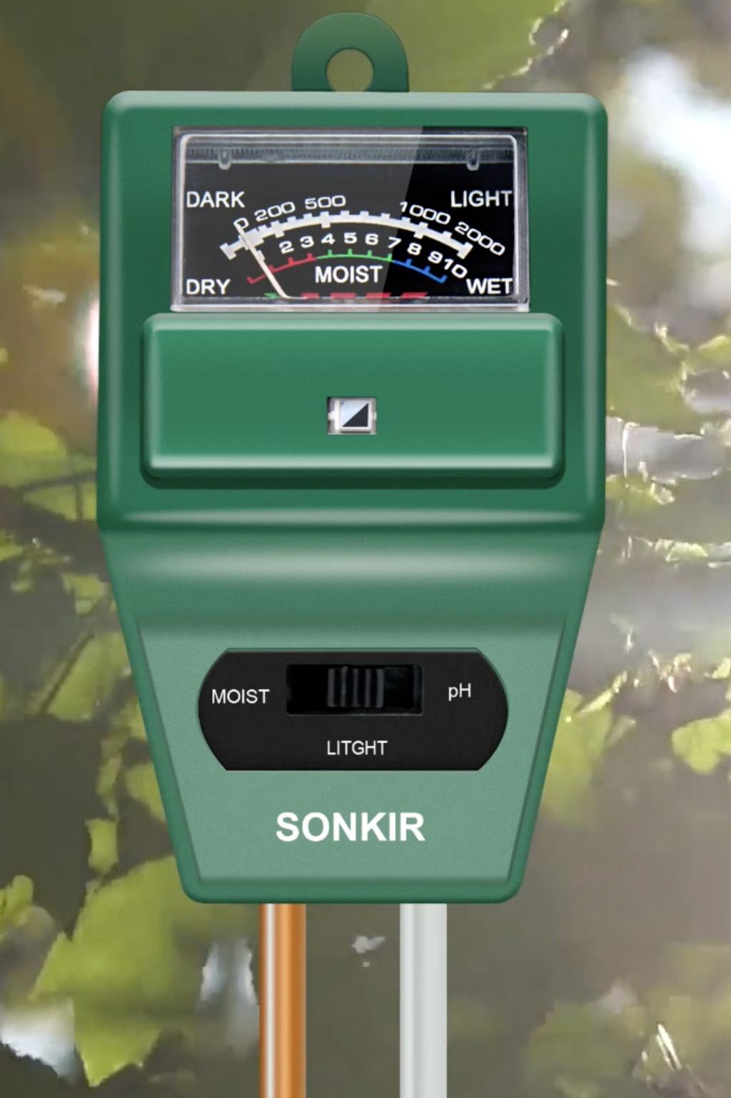 a close up of the plant meter in front of a plant