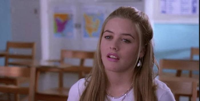 a scene from &quot;clueless&quot; where cher is swooning in class