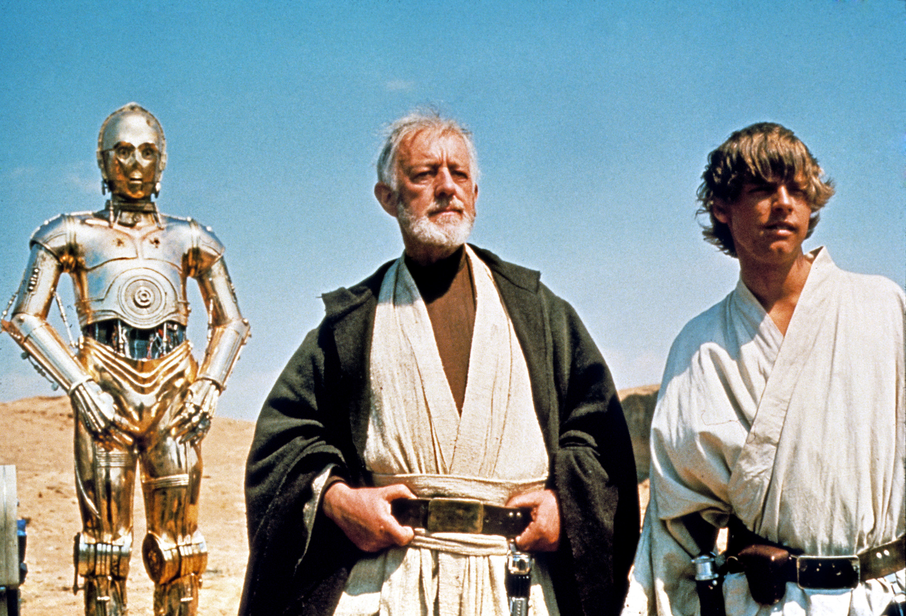 C-3PO, Alec Guinness and Mark Hamill in Star Wars: Episode IV — A New Hope