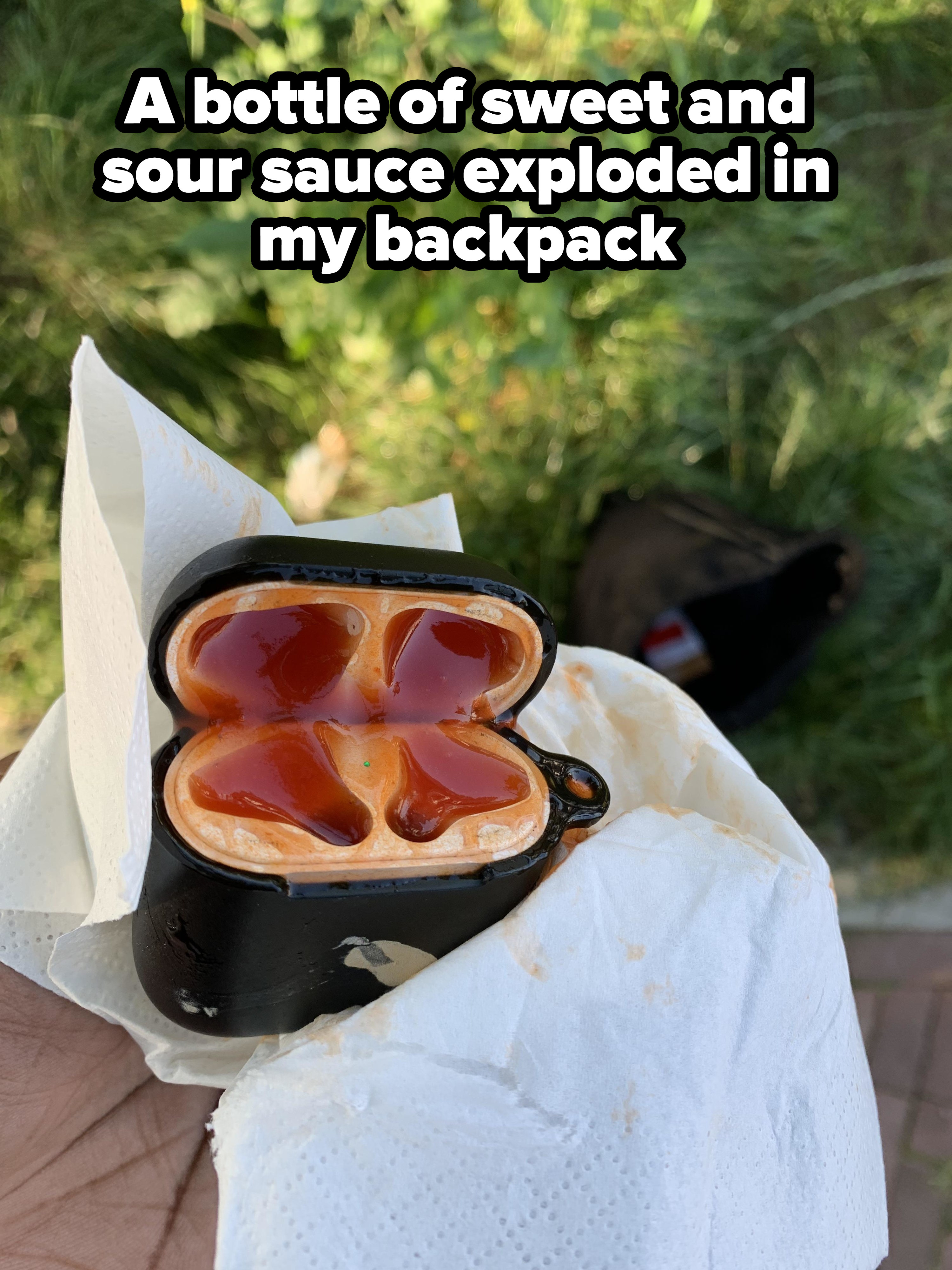airpods case filled with sweet and sour sauce after a bottle explosion