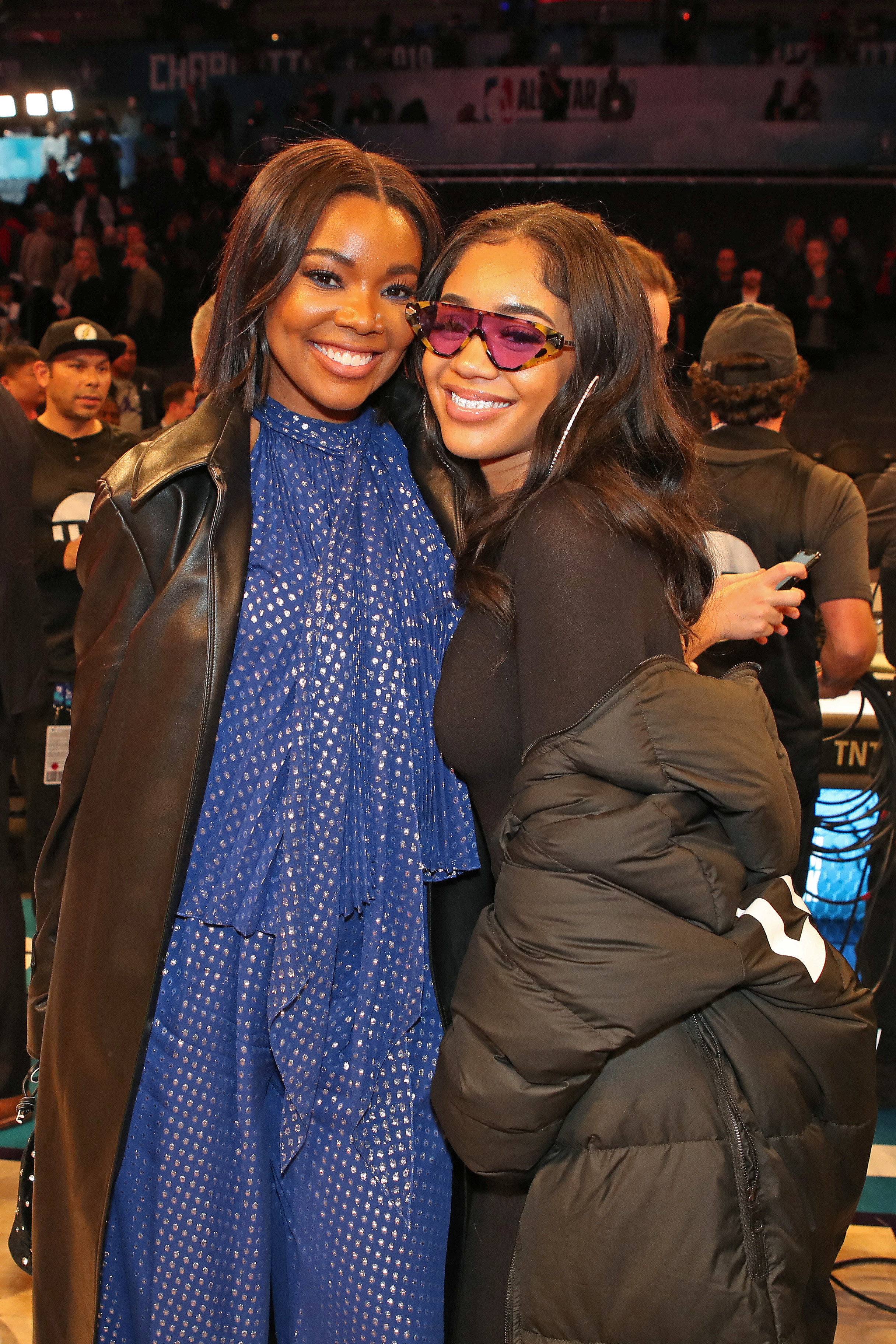 Gabrielle Union and Saweetie smiling