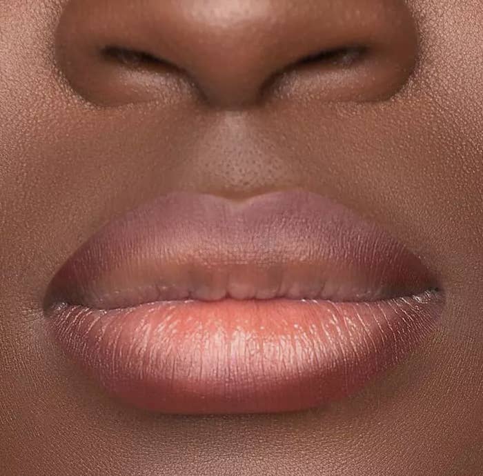 a person with the lip liner on
