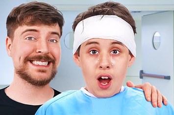 mrbeast smiling with a crying child