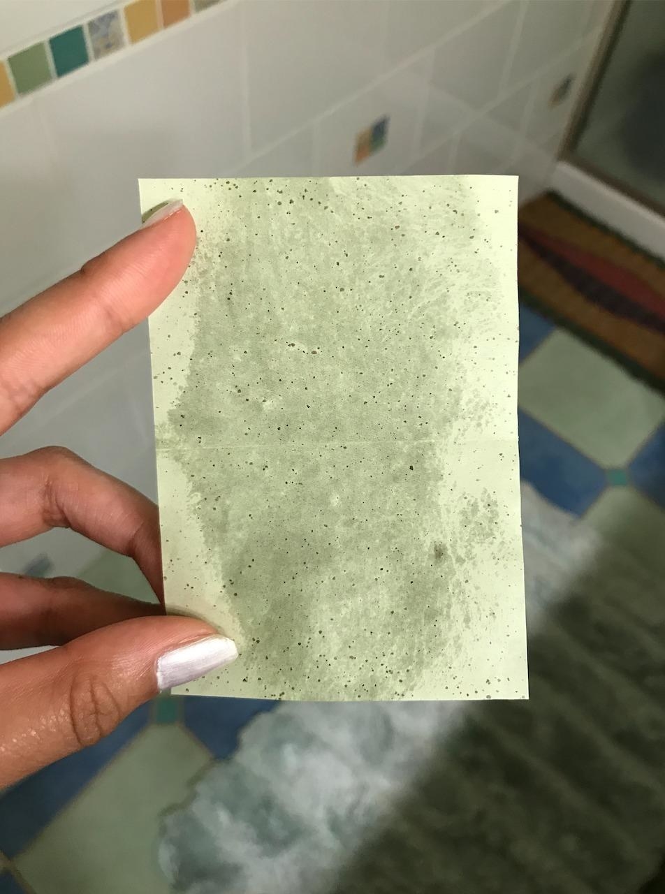 a reviewer's used green sheet that's soaked in oil