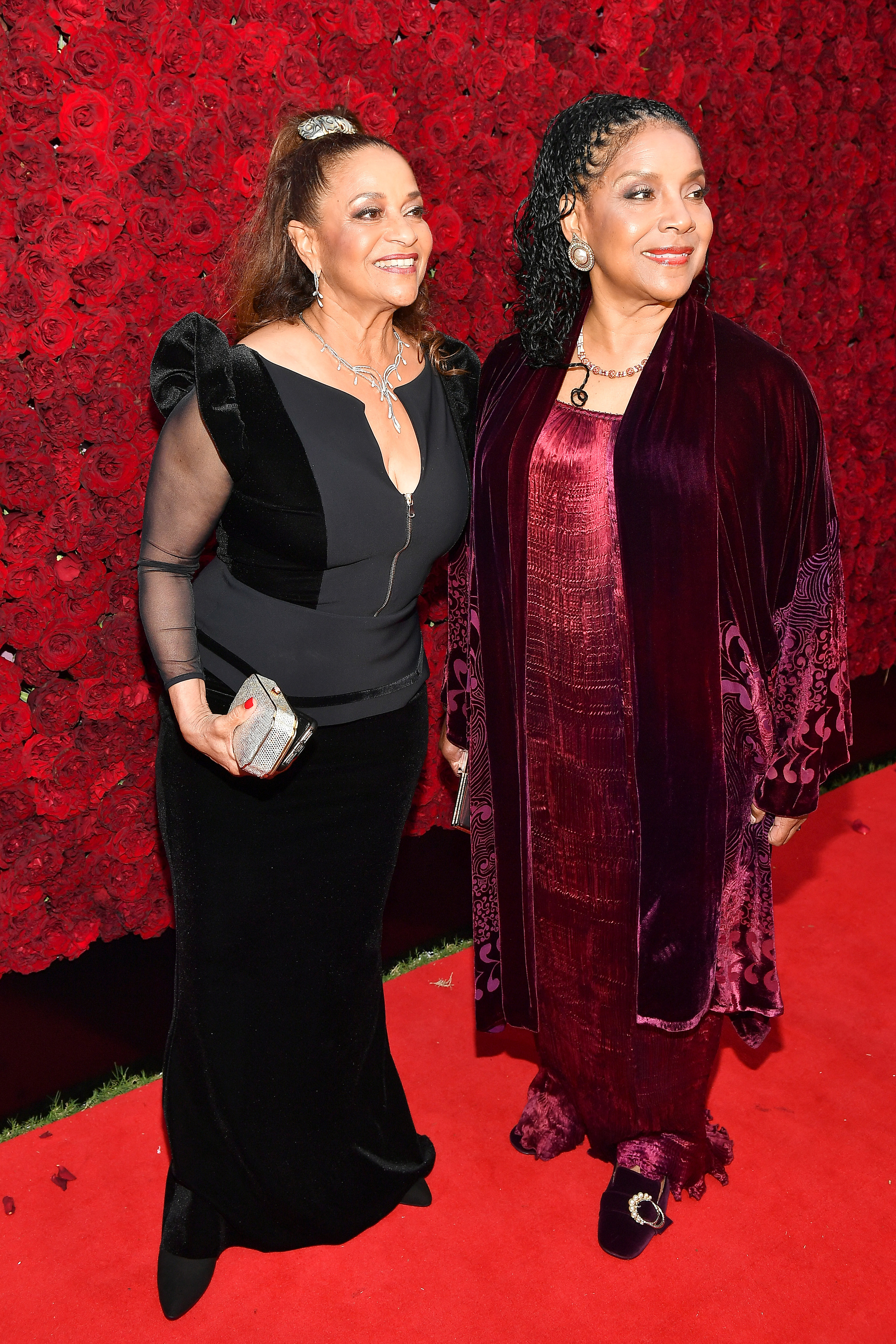 Debbie Allen and Phylicia Rashad smiling on the red carpet
