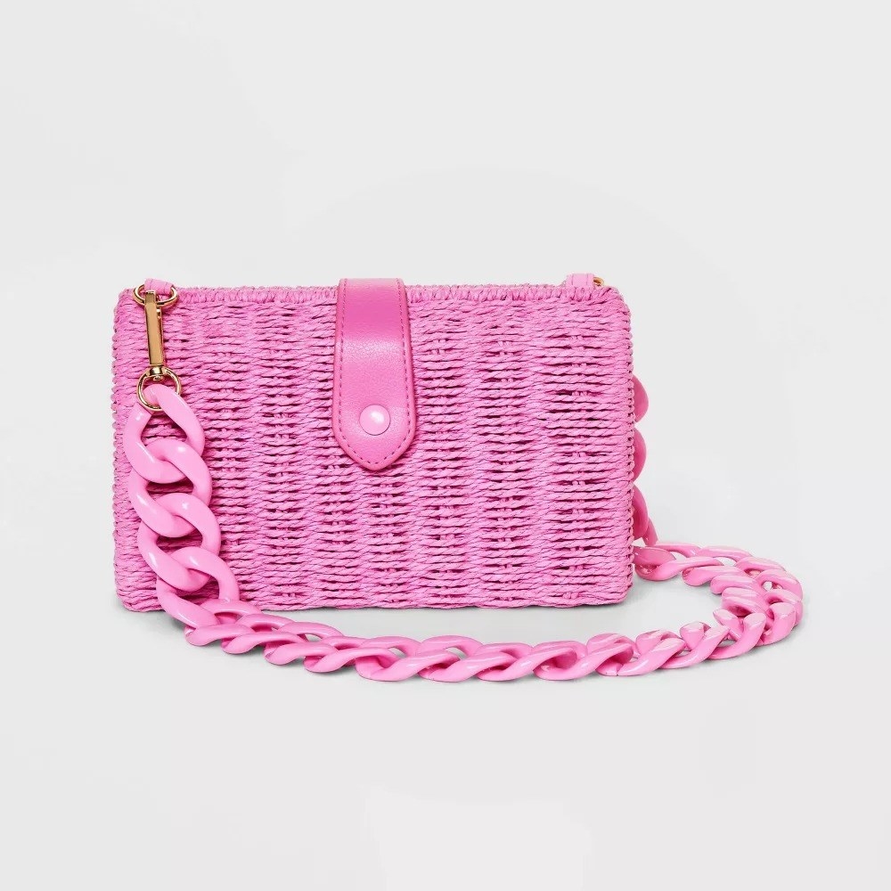 the pink straw bag with matching pink chain