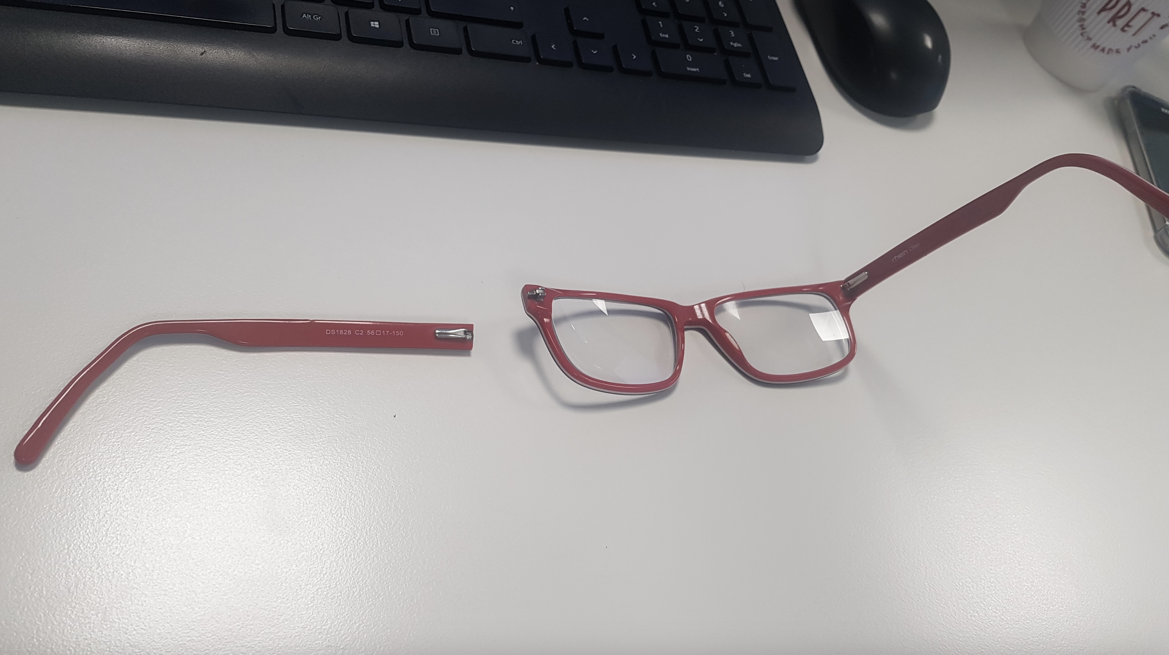 Broken glasses on desk