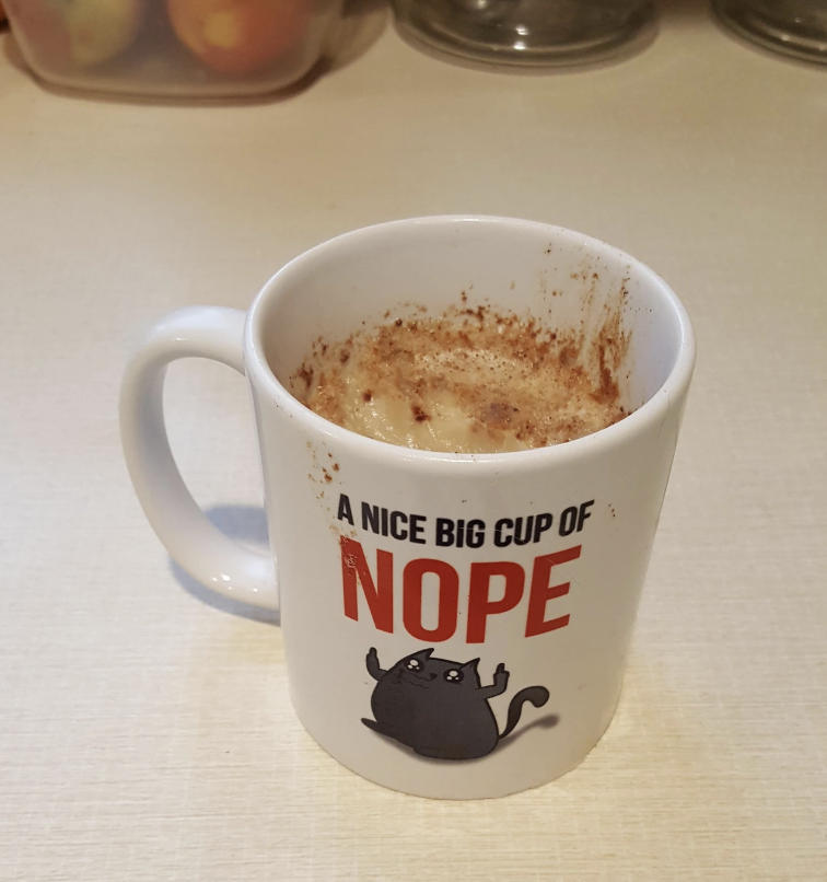 mug that says a nice big cup of nope filled with grease
