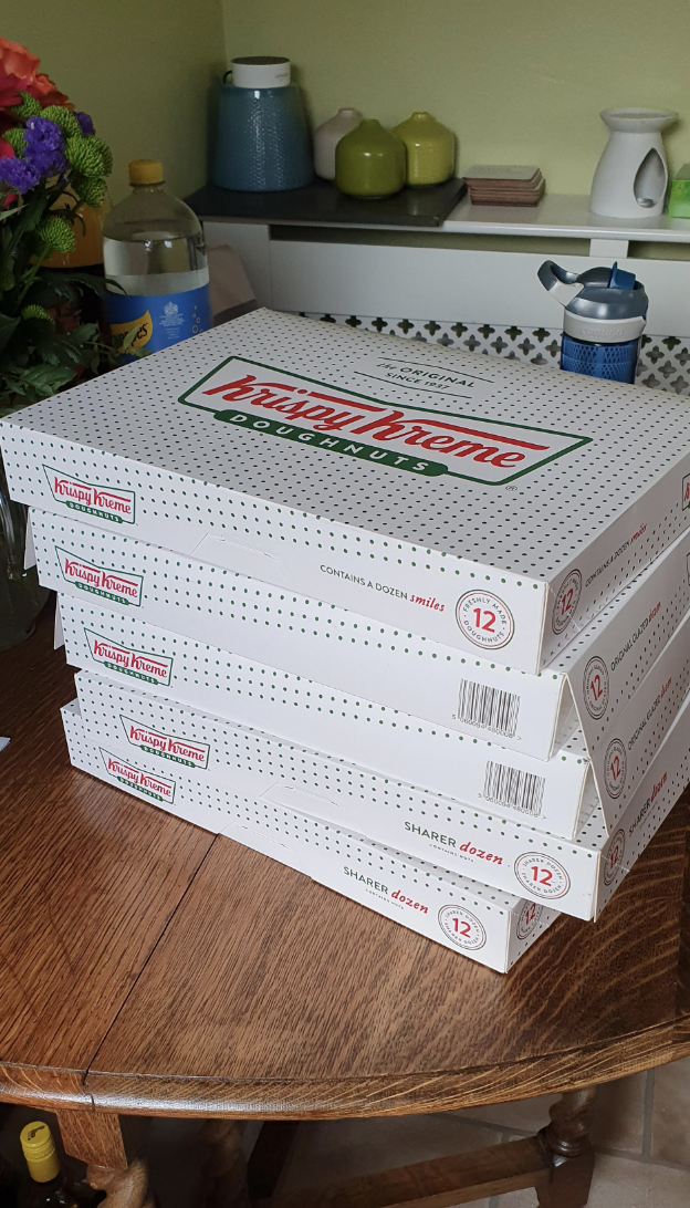 Pile of boxes of donuts