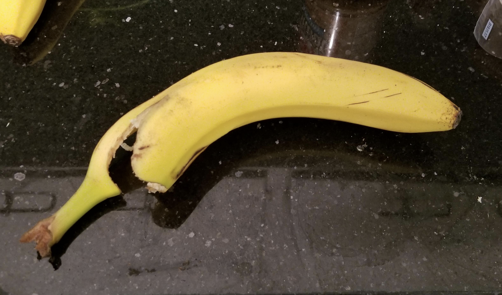opened banana on the counter