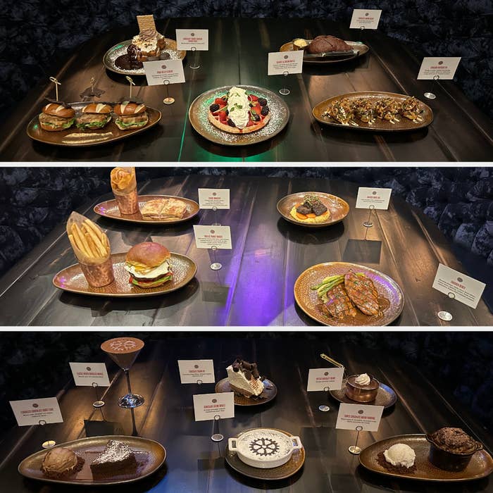 Many plates of savory and sweet dishes displayed on a table