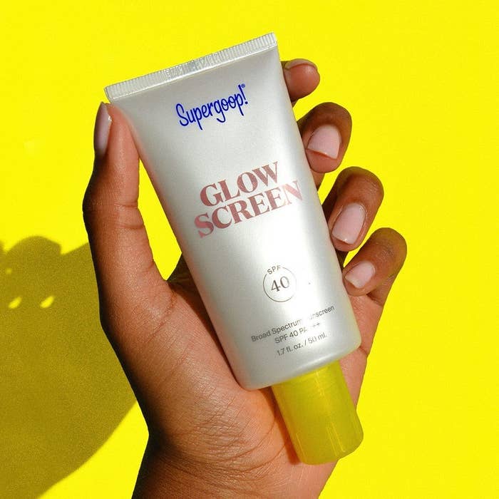 the sunscreen against a plain background