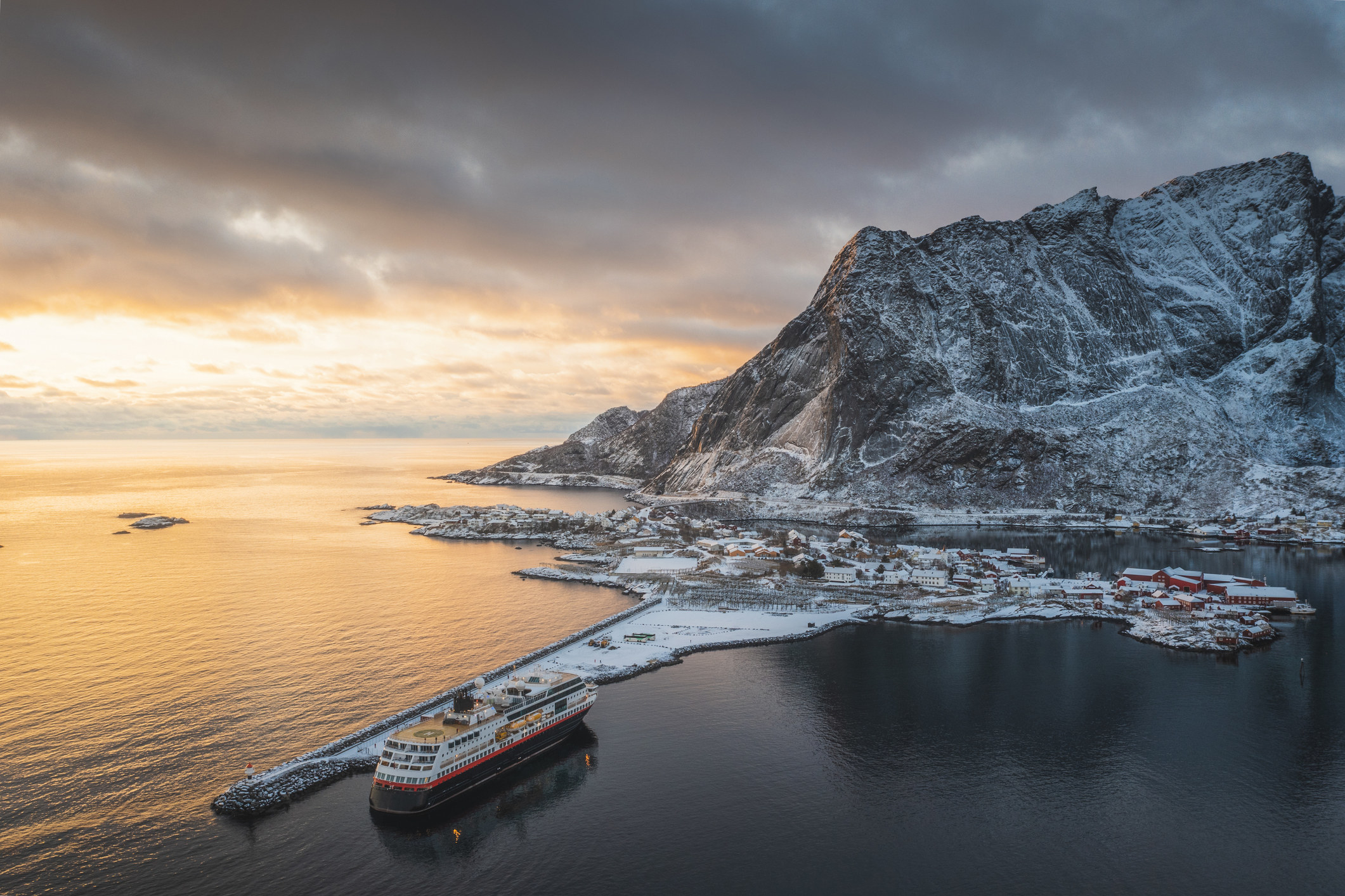 A mountainous coastal scene and inlet