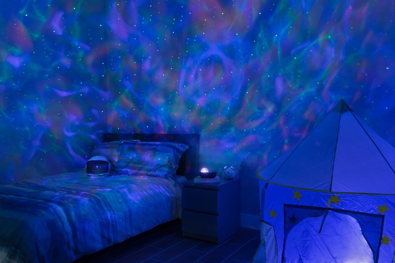 A projector illuminating a bedroom