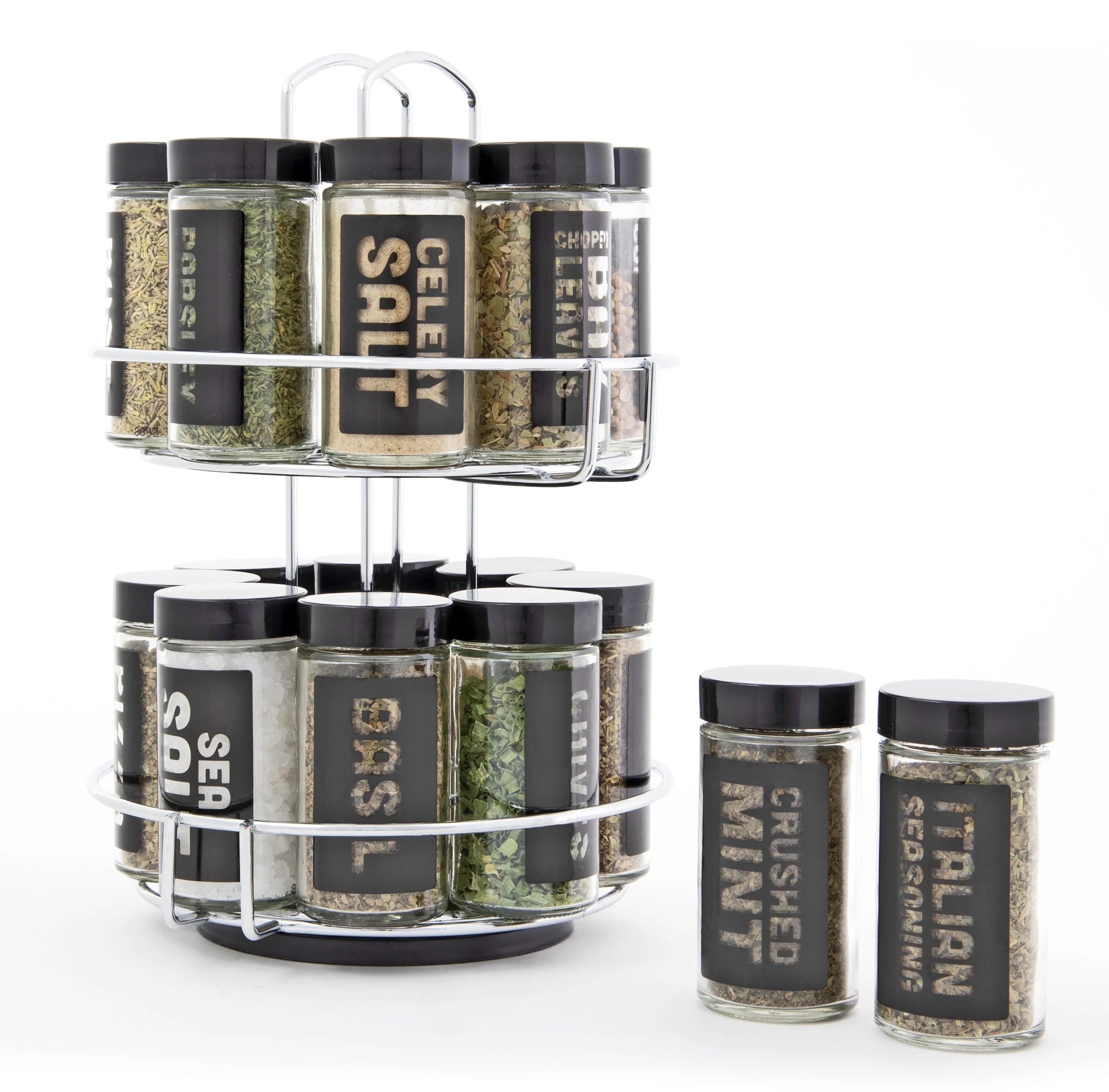 a silver spice rack holding spices like basil, crushed mint, Italian seasoning, and sea salt