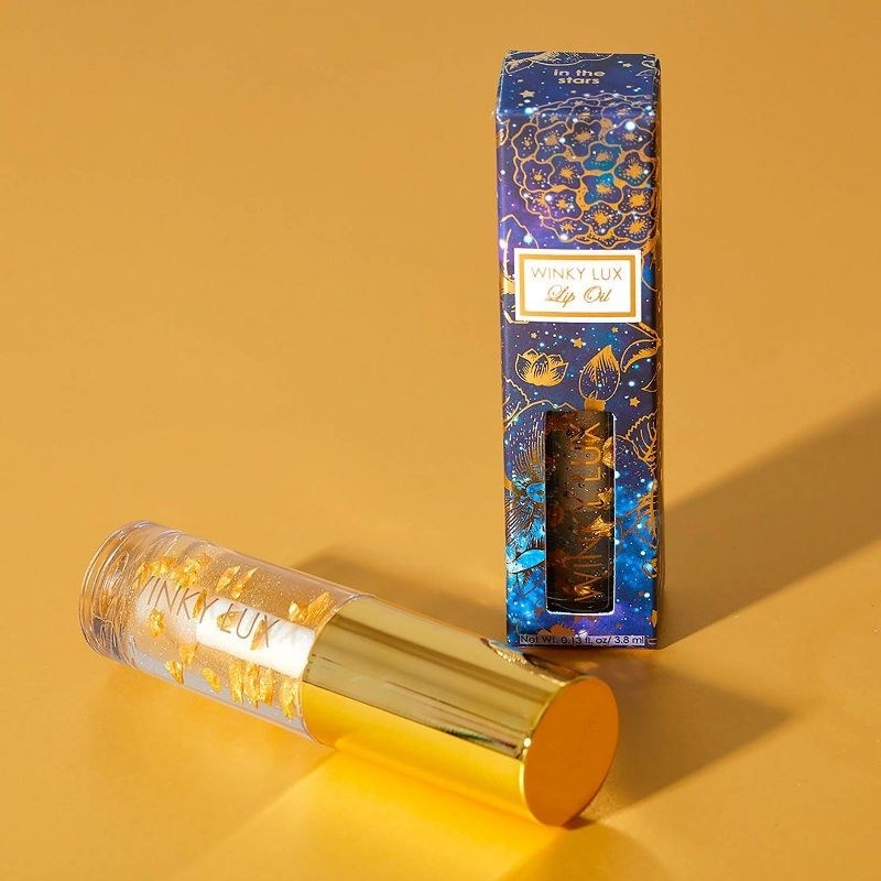 A lip oil with its packaging box