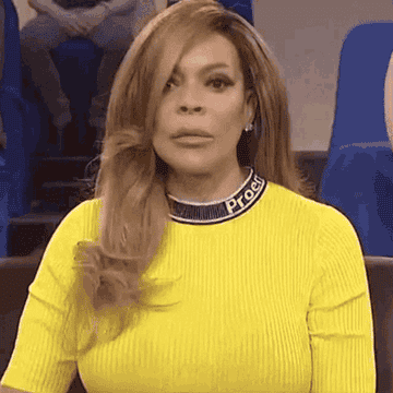 Wendy Williams turning and putting her hand under her chin