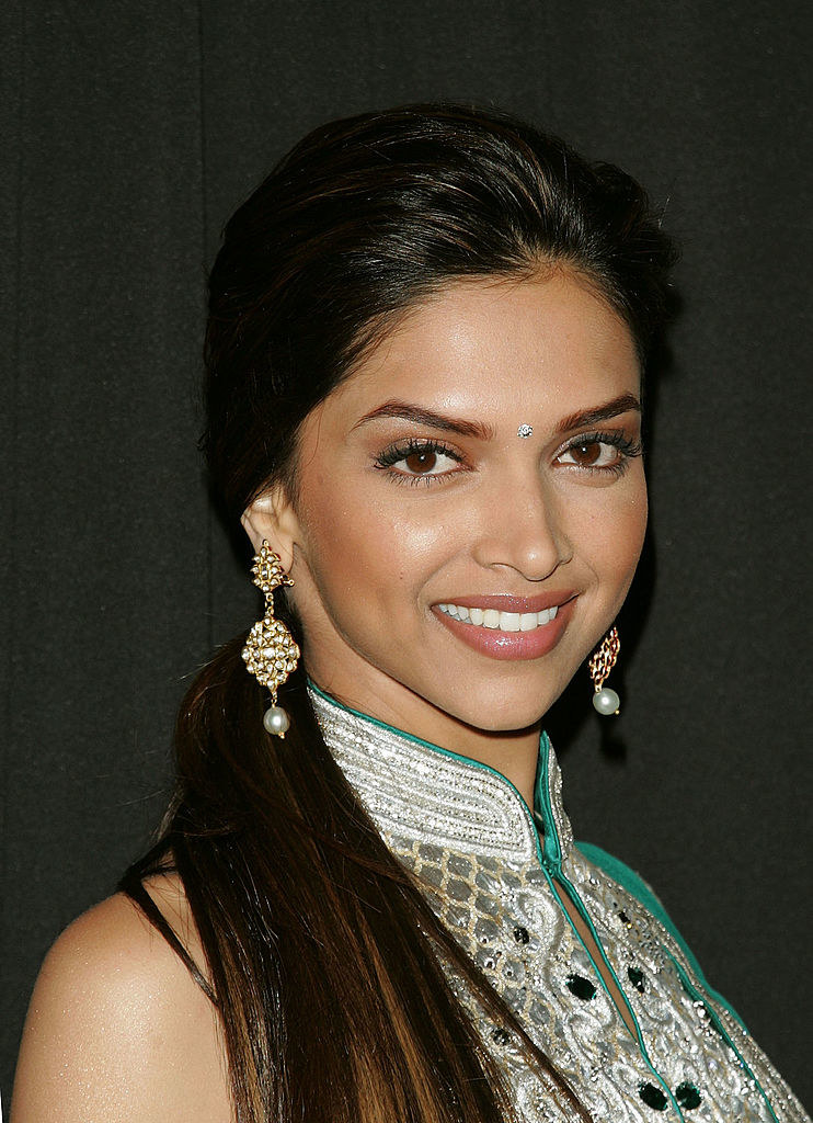 Deepika smiles for a picture