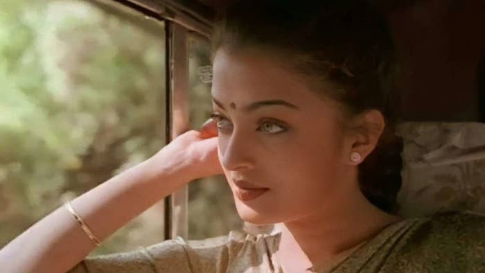 Aishwarya Rai in a car looking out the window
