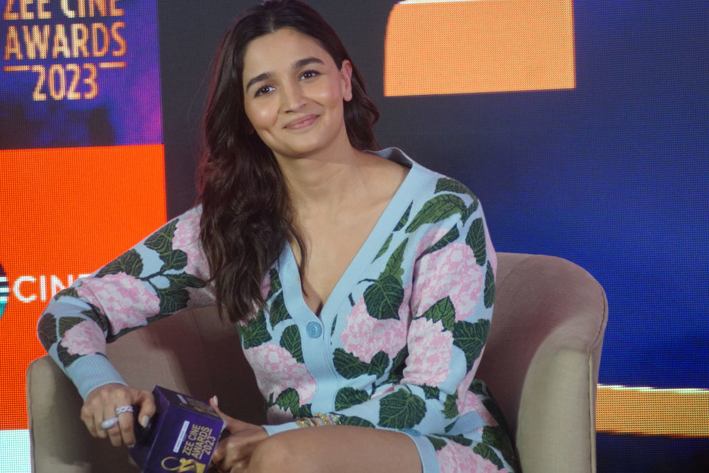Alia smiles during an event