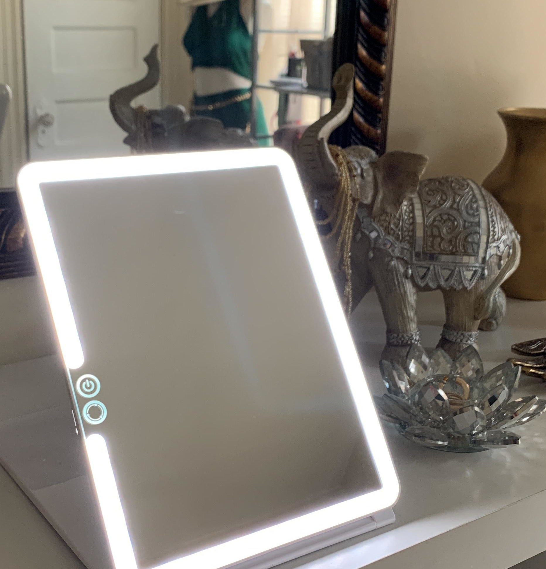 reviewer&#x27;s mirror on dresser lit up
