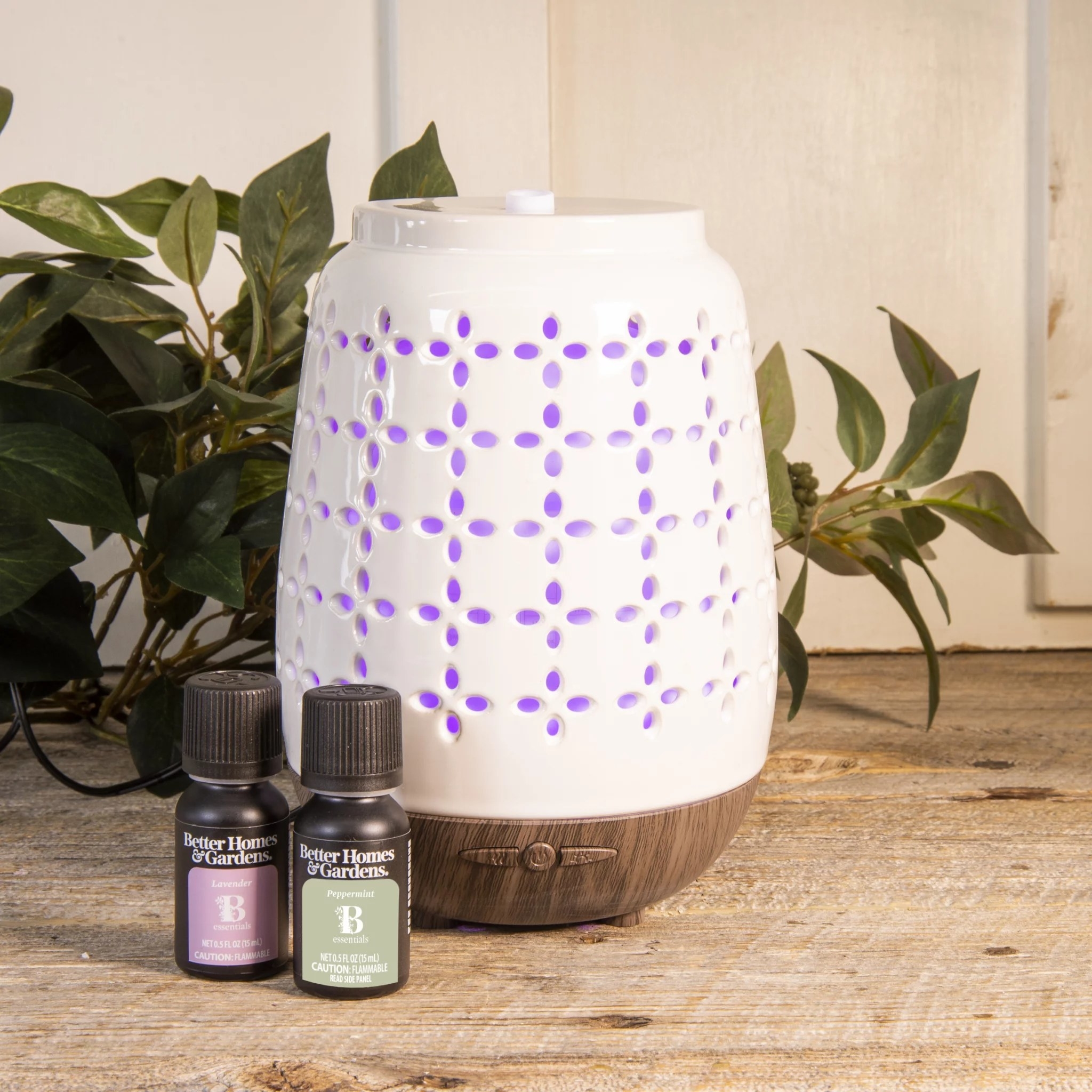 The oil diffuser with two bottles of essential oils