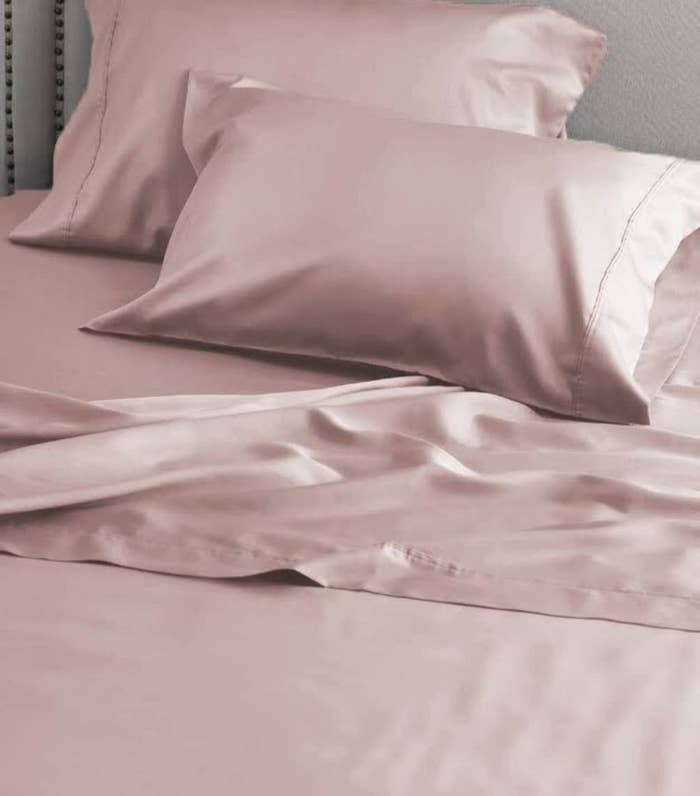reviewer image of the coral pink satin pillowcases