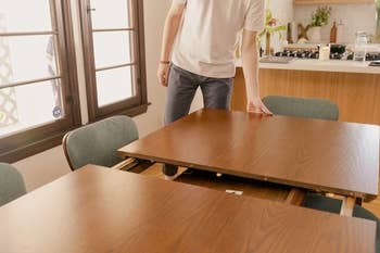 a dining table expanding