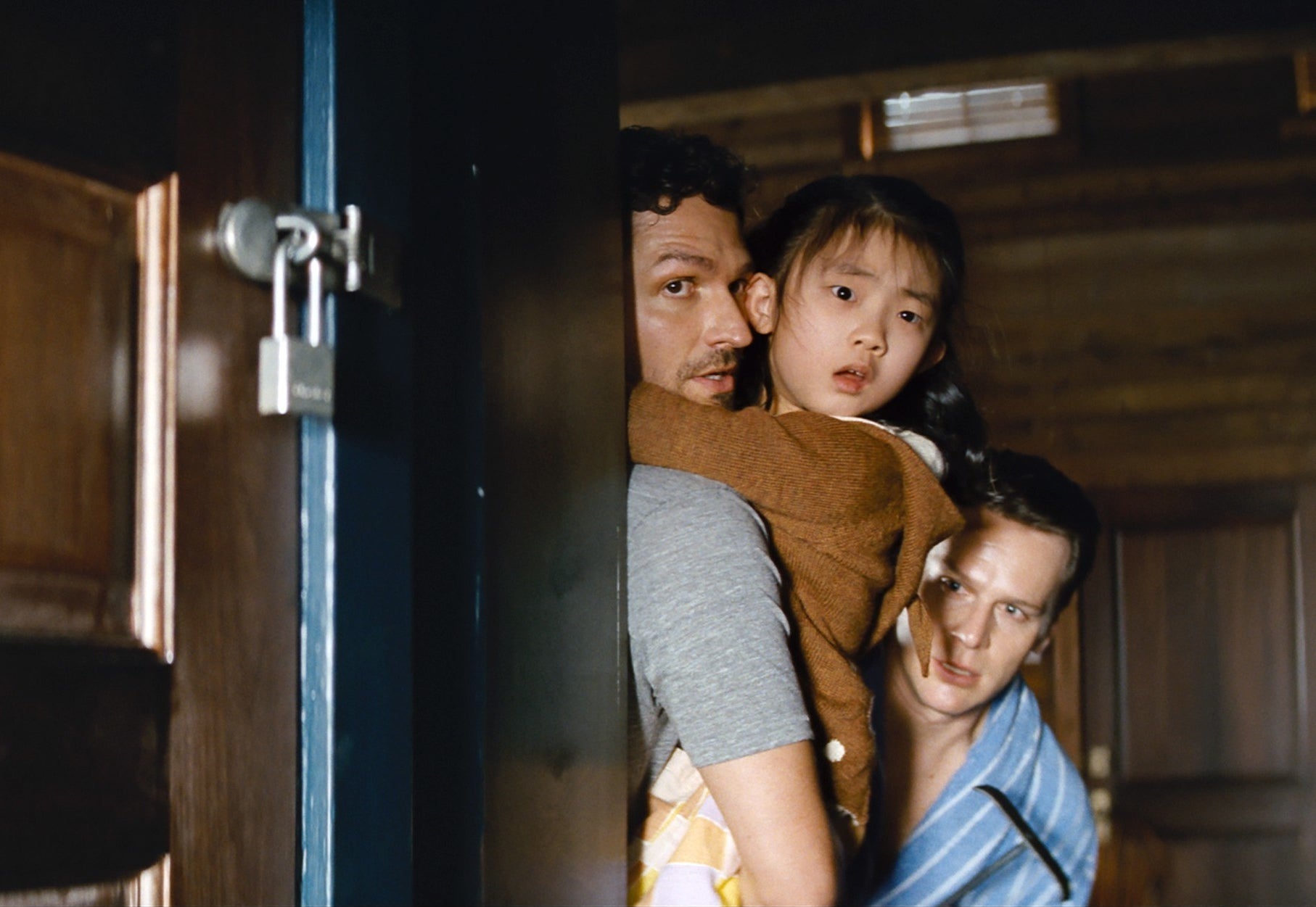 Ben Aldridge, Kristen Cui and Jonathan Groff in Knock at the Cabin