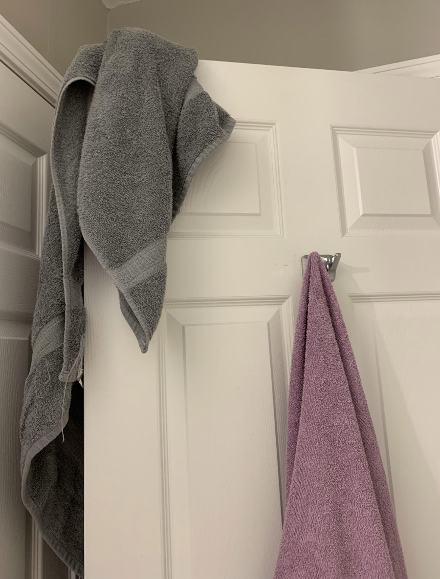 A towel hanging on a door