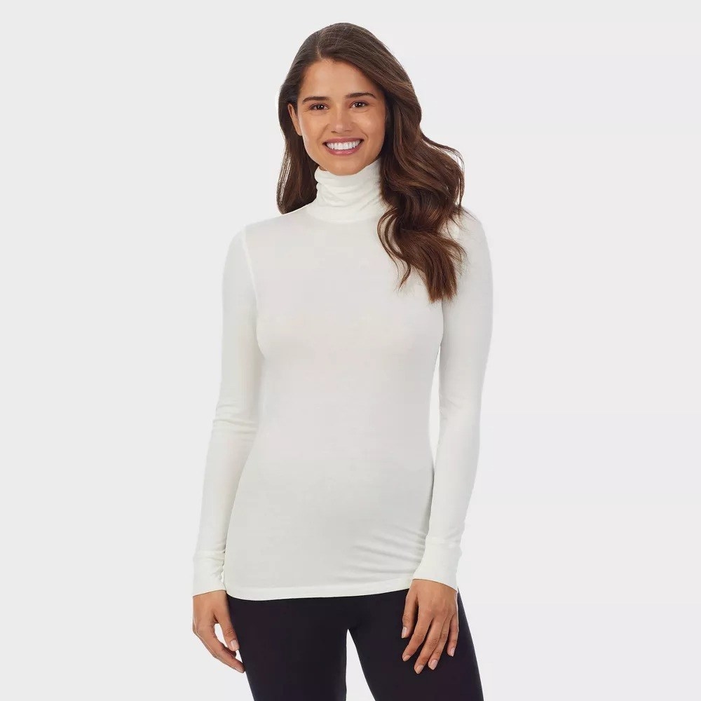 A model wearing the turtleneck in white