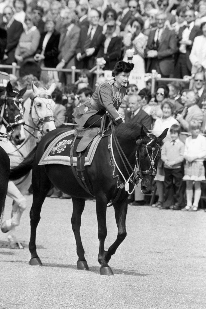 Queen Elizabeth II riding a horse