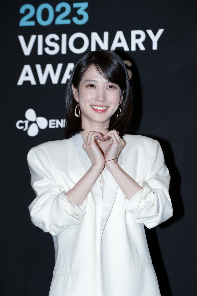 South Korean actress Park Eun-bin attends the 2023 Visionary Awards forming a heart with her hands