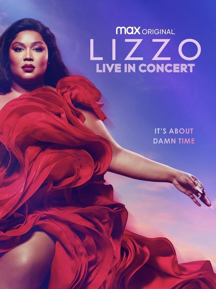 Lizzo wears a tightly layered dress that mimics flower petals that is one-shouldered