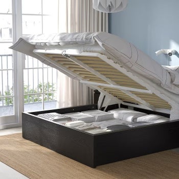 the storage bed lifted up showing the storage space beneath