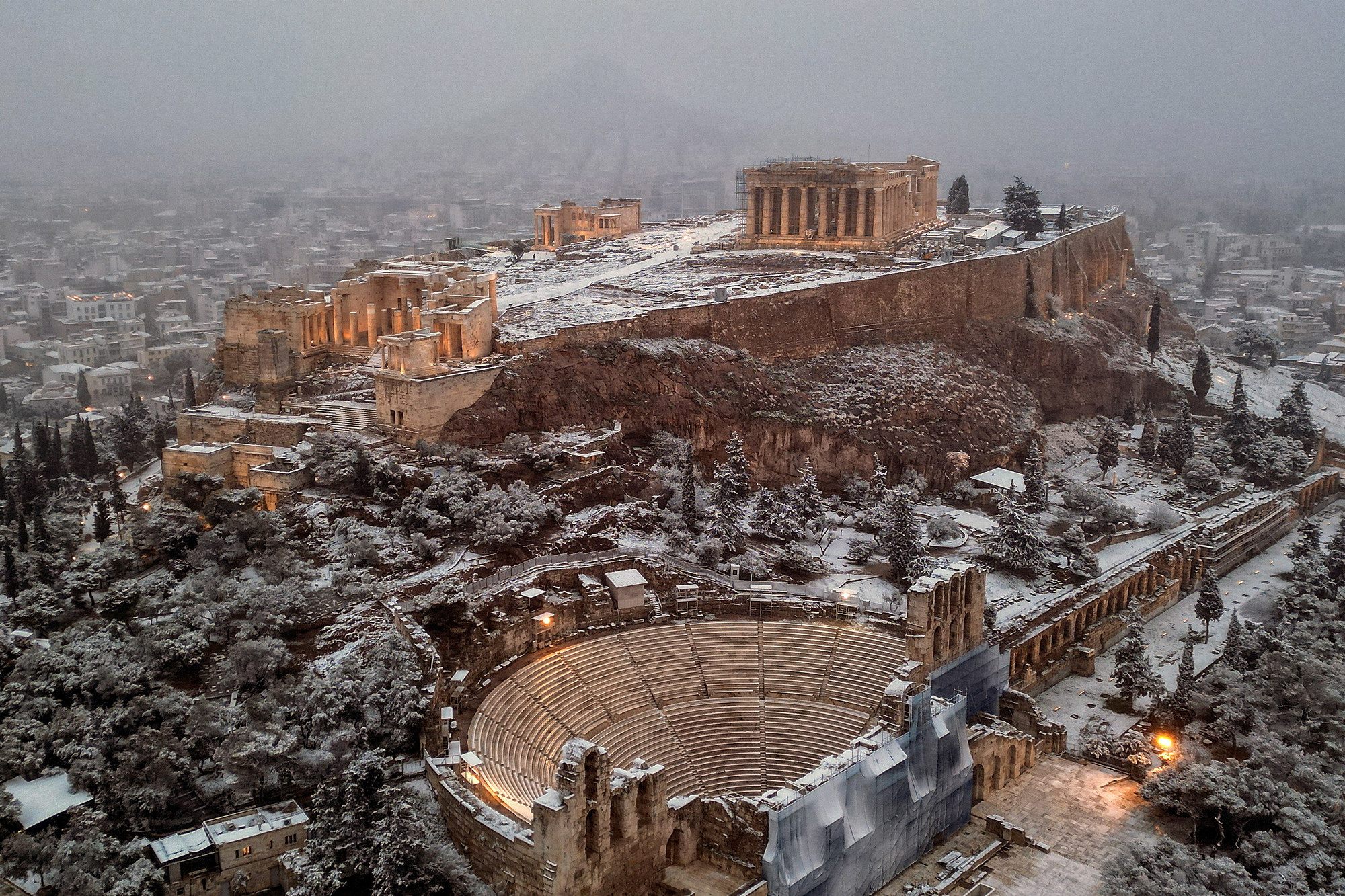 the parthenon temple shot from overhead on a snowy overcast day