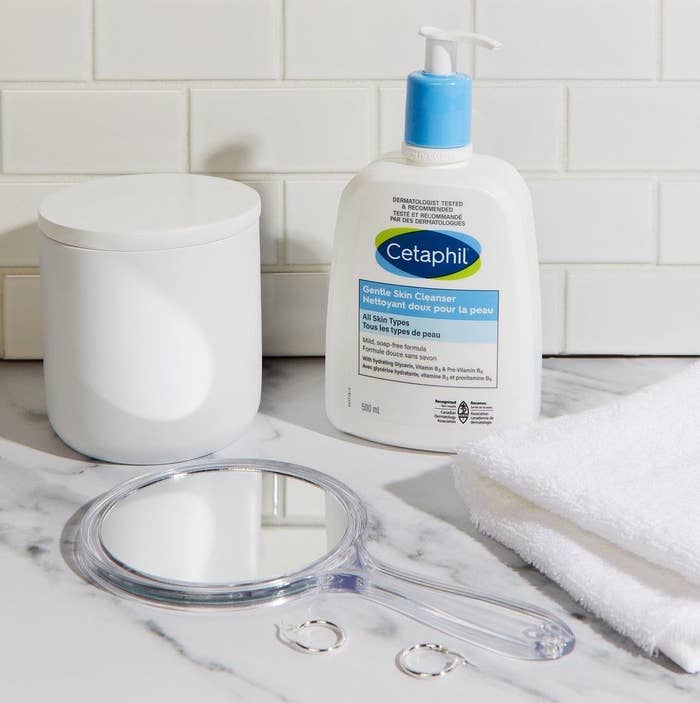 the cetaphil bottle on a bathroom countertop