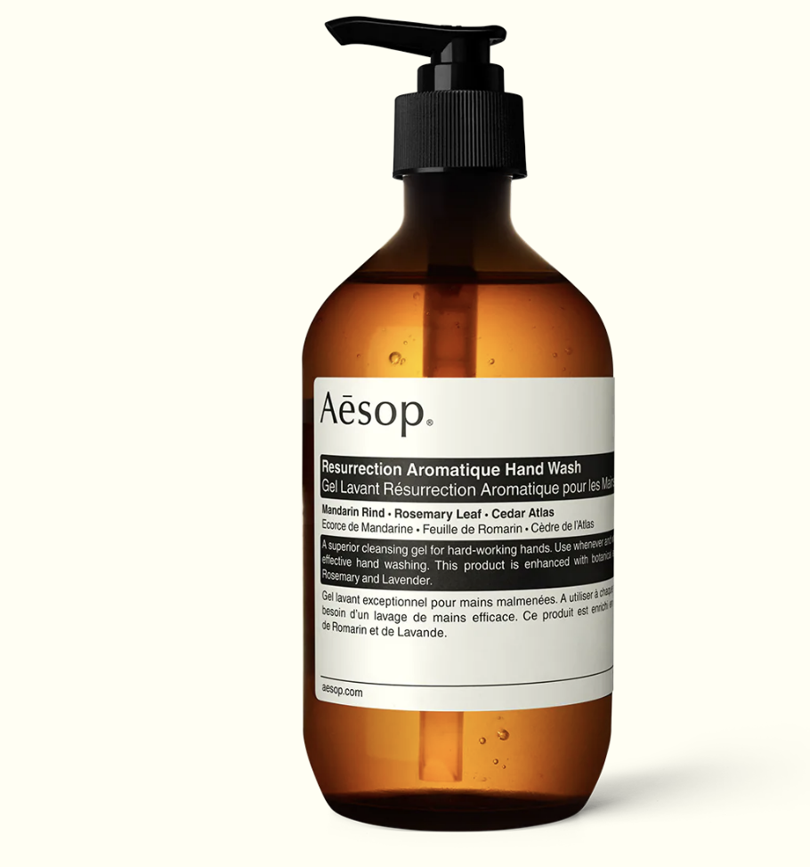 A bottle of Aesop hand wash that is scented with mandarin rind, rosemary leaf, and cedar atlas