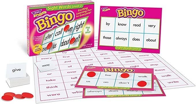 The game laid out to show the bingo card, list of words, and chips