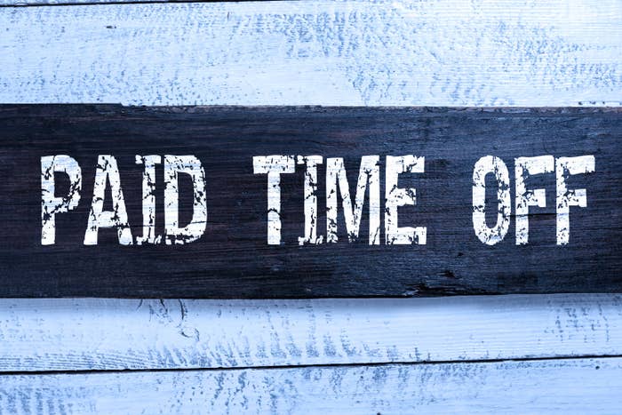 sign that says, paid time off