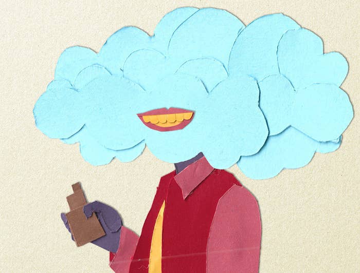 An illustratin made with cut paper of a person with a vape cloud over their face and their yellow smile is showing through